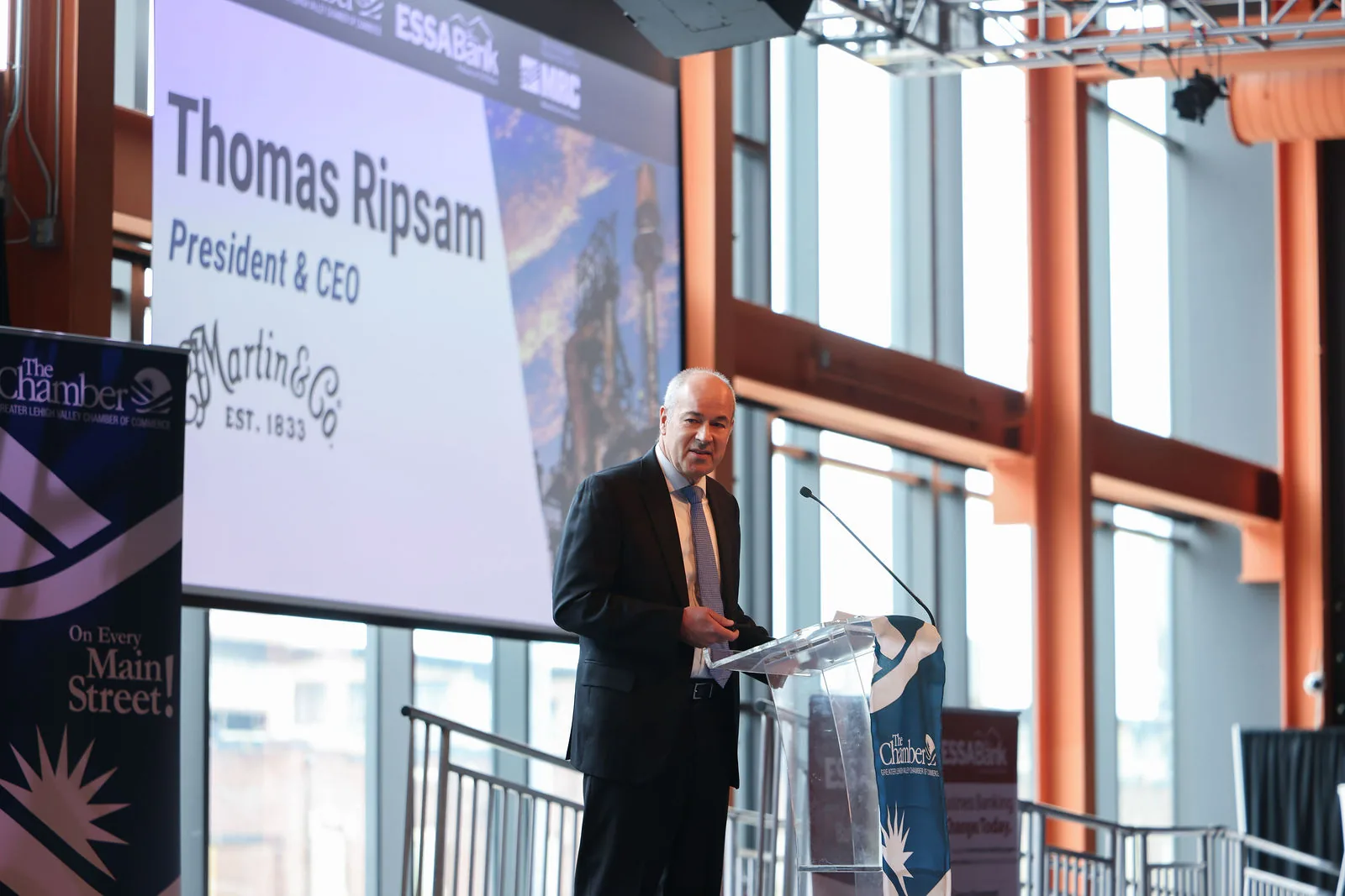 Thomas Ripsam, President and CEO of C.F. Martin & Co., giving the keynote at the podium