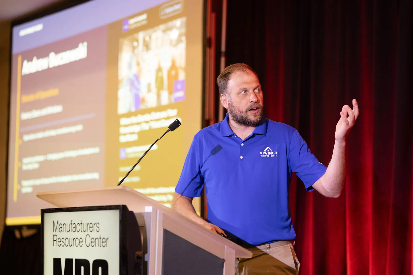 Andrew Buczewski of Viwinco presenting in front of his slide