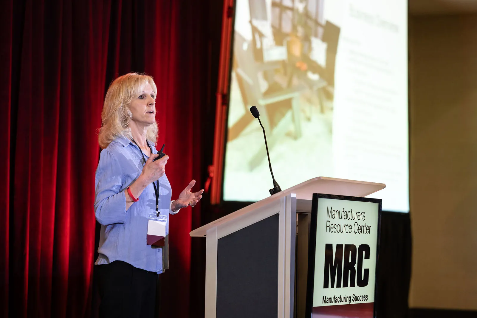 Danielle Hess presenting at the MRC podium