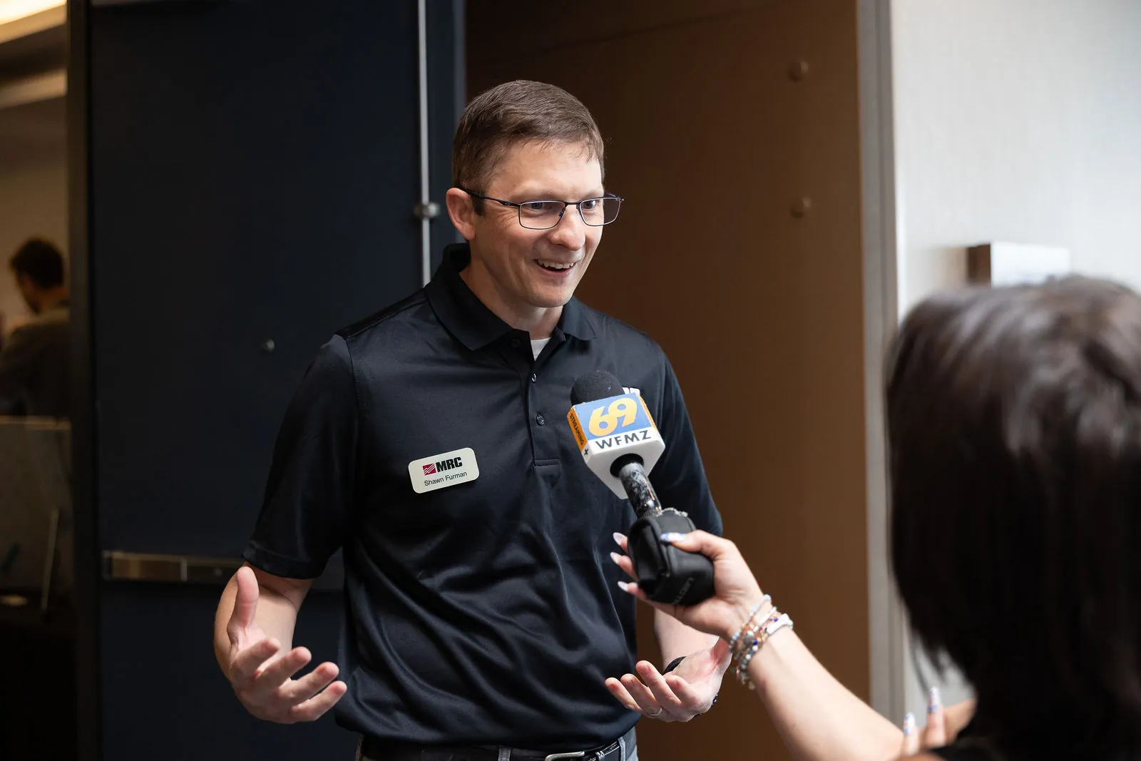 MRC's Shawn Furman being interviewed with a WFMZ 69 News microphone